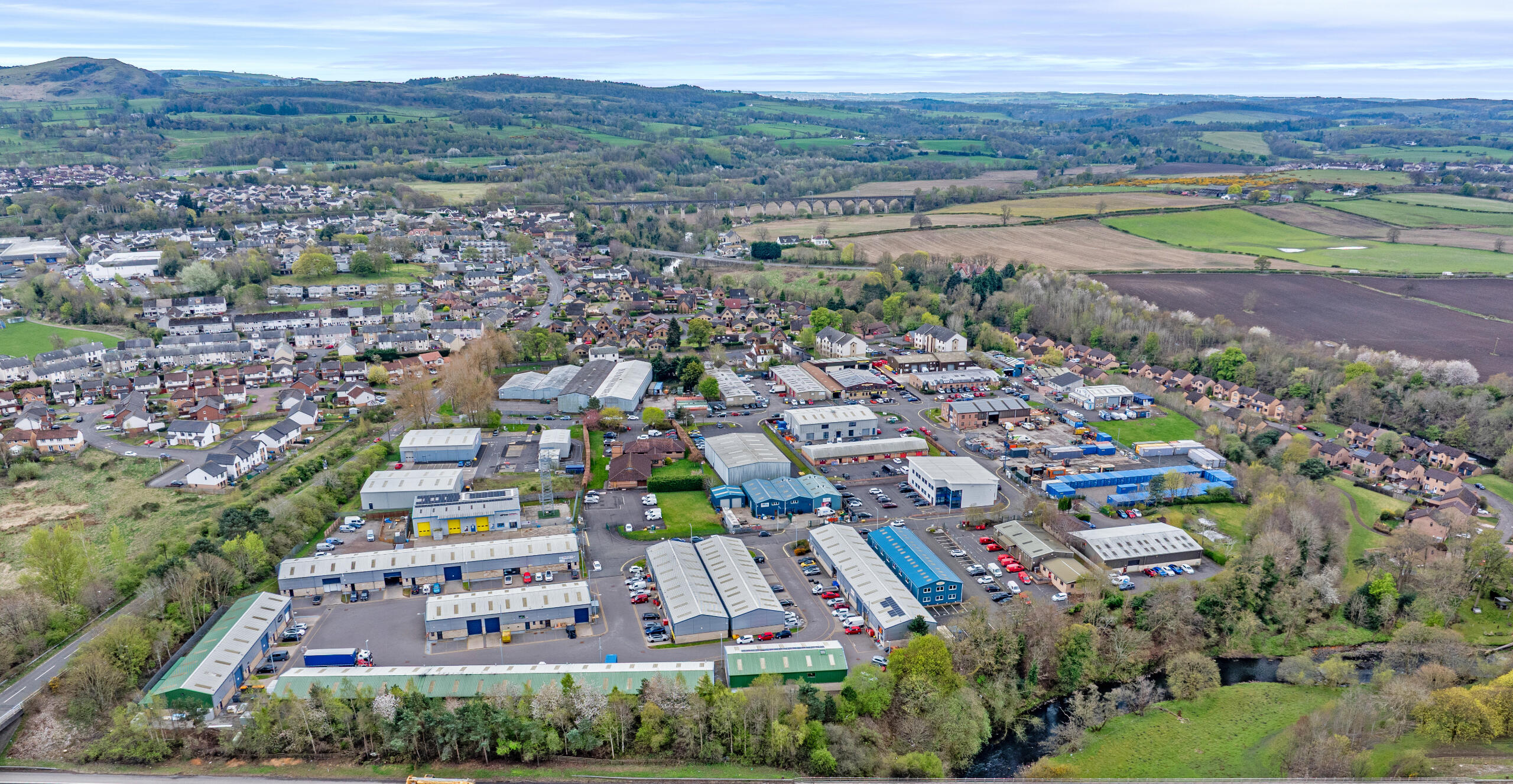 Aerial view of Mill Road Industrial Estate in Linlithgow Aerial photo of Mill Road Industrial Estate in Linlithgow, home to Boxxs Self Storage serving Polmont and Falkirk customers